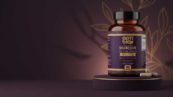 Optibio Magnesium Five Form Complex bottle on a plum background with gold leaf detail